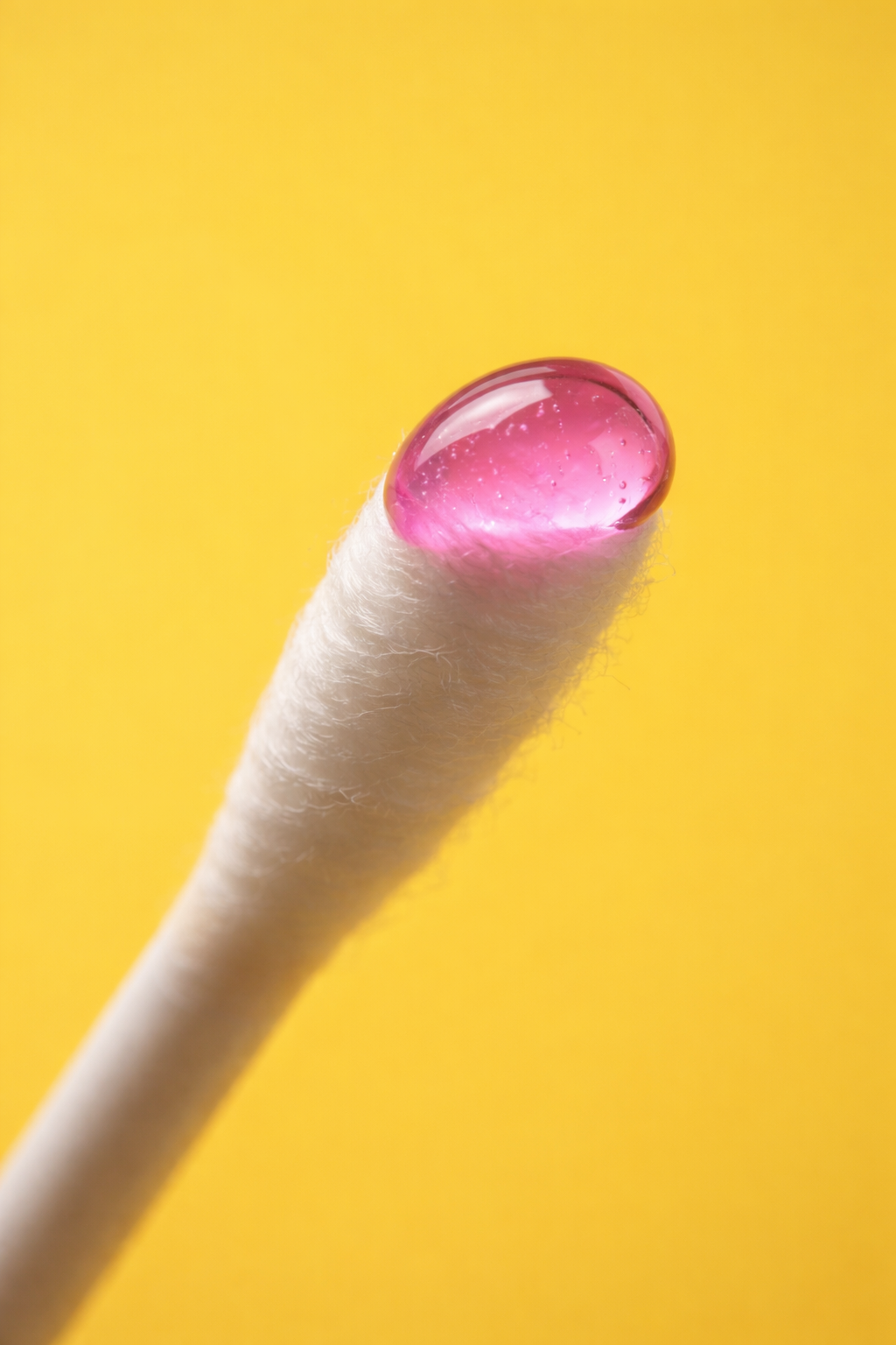 Q-tip with numbing topical gel